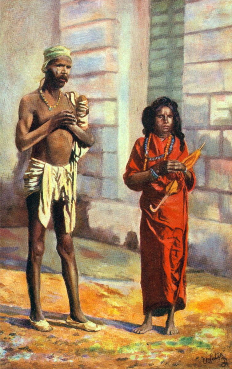 A closeup of a postcard showing a painting of a man un a turban, and a young woman in a long red dress.